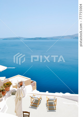 Beautiful summer scenery two sun chairs loungers. Concept of calmness relaxation Beautiful summer scenery two sun chairs loungers. Concept of calmness relaxation 77755004