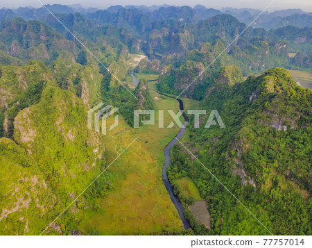 the majestic scenery on Ngo Dong river in Tam Coc Bich Dong view from drone in Ninh Binh province of Viet Nam 77757014