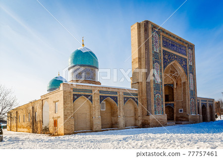 Decorated entrance and two domes of Hazrati Imam complex, religi 77757461