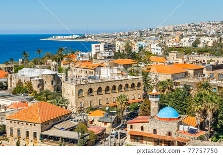 Mediterranean city historic center panorama with old church and mosque and residential buildings in the background, Biblos, Lebanon Mediterranean city historic center panorama with old church and mosque and residential buildings in the background, Biblos, Lebanon 77757750