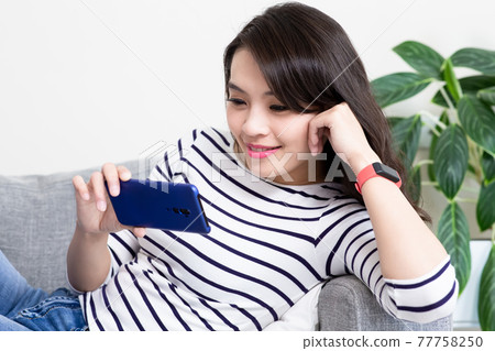 woman use smart phone woman use smart phone 77758250