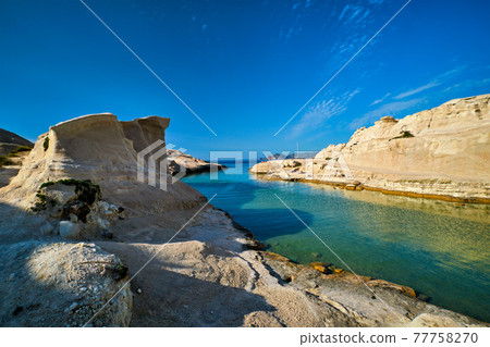 Famous Sarakiniko beach on Milos island in Greece 77758270