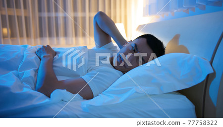 asian man has insomnia 77758322