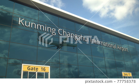 Commercial plane landing reflecting in the windows with Kunming Changshui International Airport text. 3d rendering 77758378