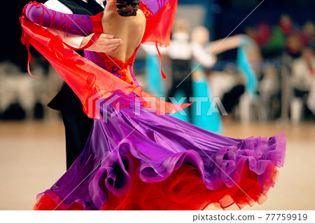 couple of dancers dancing waltz in dancesport competition 77759919