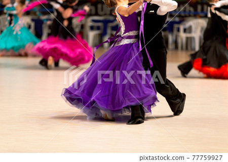 young couple dancers dancing waltz in competition young couple dancers dancing waltz in competition 77759927
