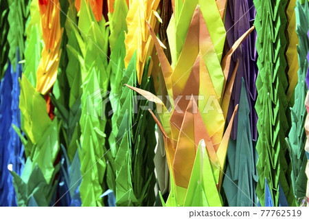 A thousand paper cranes made by bundling colorful paper cranes 77762519