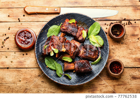 Roasted beef brisket on the ribs 77762538