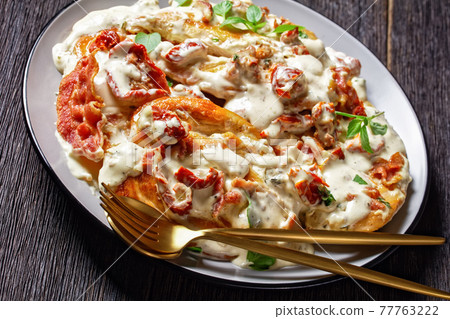 Marry Me Chicken on a plate, top view 77763222
