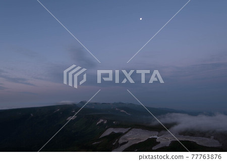 Remaining moon and Mt. Tomuraushi 77763876