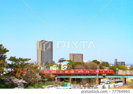 Scenery of cherry blossoms and Meitetsu train around Okazaki Castle Scenery of cherry blossoms and Meitetsu train around Okazaki Castle 77764993