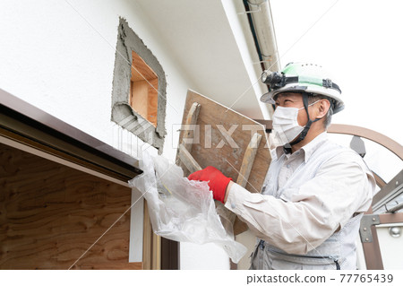 Plasterer image, outer wall work, around the ventilation fan Plasterer image, outer wall work, around the ventilation fan 77765439