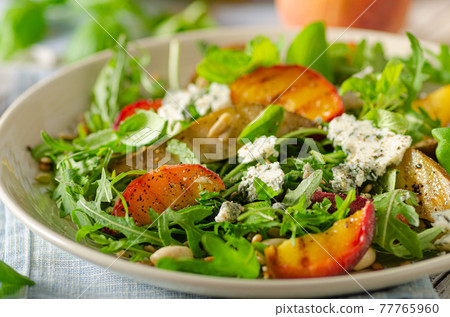 Grilled fruit salad 77765960
