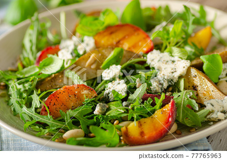 Grilled fruit salad 77765963