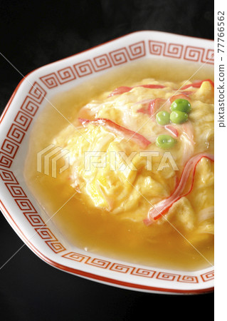 Hot bean paste Chinese style omelet rice, Tianjin rice shot on a black background Hot bean paste Chinese style omelet rice, Tianjin rice shot on a black background 77766562