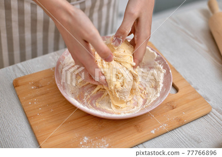 housewife cooking on kitchen at the home. 77766896