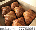Plain french croissants. Side view. 77768061