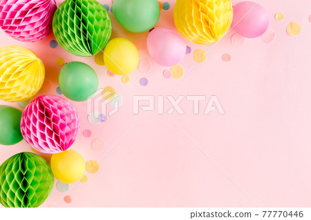 Balloons and confetti on pink background. Birthday, holiday concept. Flat lay, top view. Birthday party background 77770446