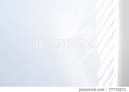 Architectural shadows. Sunlight architecture abstract background with light, black shadow overlay from window on white texture wall. Mockups, posters, stationary, wall art, design presentation. 77770871