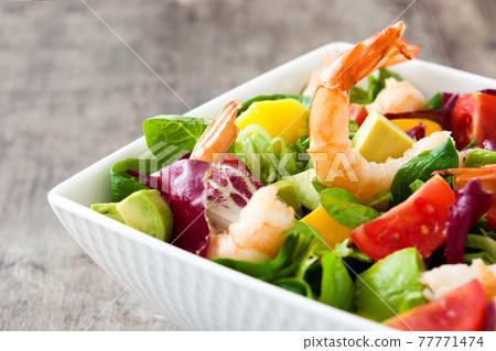 Shrimps salad with mango and avocado Shrimps salad with mango and avocado 77771474