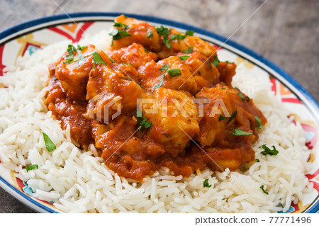 Chicken tikka masala in bowl 77771496