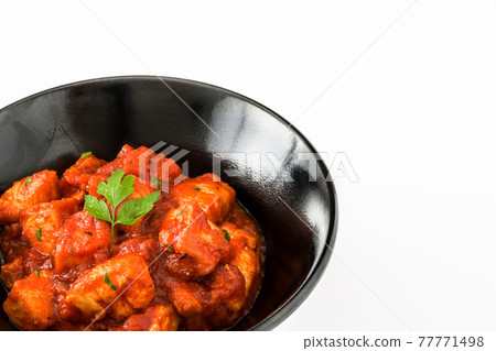 Chicken tikka masala in bowl Chicken tikka masala in bowl 77771498
