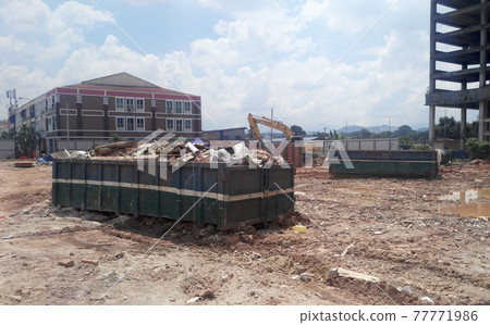 SELANGOR, MALAYSIA -JANUARY 15, 2017: Construction wasted disposal bin used at the construction site. SELANGOR, MALAYSIA -JANUARY 15, 2017: Construction wasted disposal bin used at the construction site. 77771986