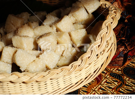 Glutinous rice or locally called pulut impit cook and steam and the press in a container. It was then cut into cubes before serving. Malay traditional food. Glutinous rice or locally called pulut impit cook and steam and the press in a container. It was then cut into cubes before serving. Malay traditional food. 77772234