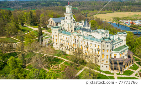Aerial view on the castle in Hluboka nad Vltavou, historic chateau with beautiful gardens near Ceske Budejovice, Czech Republic Aerial view on the castle in Hluboka nad Vltavou, historic chateau with beautiful gardens near Ceske Budejovice, Czech Republic 77773766