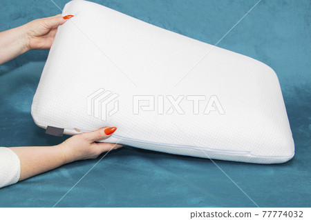 close-up of white pillows, pillow production, pillow selection. 77774032