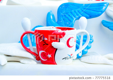 A cute mug at a Turkish souvenir shop 77775518