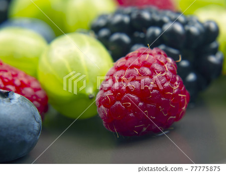 lots of fresh different berries. useful vitamin healthy food fruit. healthy vegetable breakfast 77775875