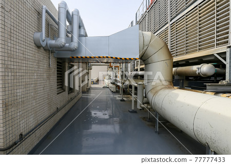 Plumbing equipment on the roof of the building (Osaka) 77777433