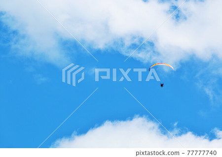Hokkaido summer blue sky and motor paraglider Hokkaido summer blue sky and motor paraglider 77777740