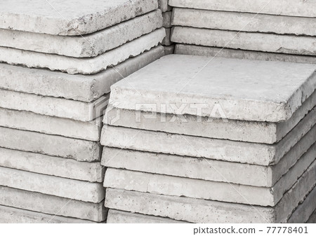 Old gray concrete plates. Building cement materials at the construction site 77778401