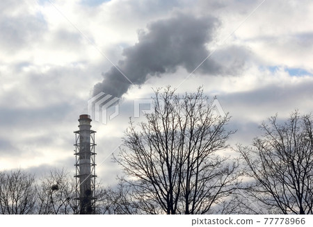 the smoke from the chimney of an industrial enterprise in the sky. the smoke from the chimney of an industrial enterprise in the sky. 77778966