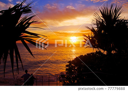 Okinawa Miyakojima A couple staring at a beautiful sunset Okinawa Miyakojima A couple staring at a beautiful sunset 77779888