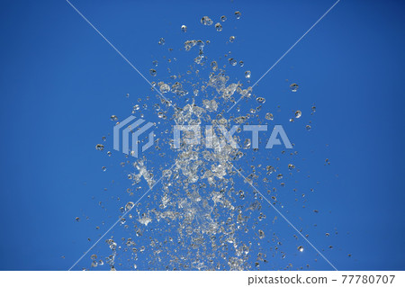 drops water of the fountain in the sky drops water of the fountain in the sky 77780707