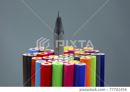 Colored pencils for drawing on a gray background. Education and creativity. Leisure and art Colored pencils for drawing on a gray background. Education and creativity. Leisure and art 77782456