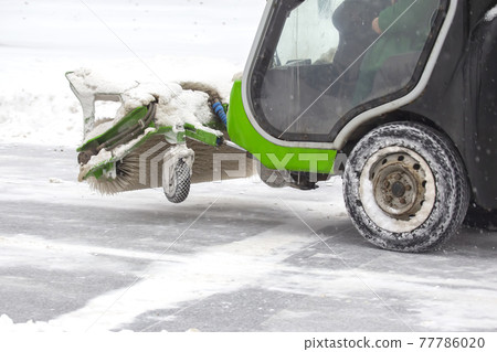 special machine for snow removal cleans the road 77786020