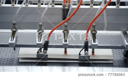 Auromatic robotic Conveyor line for production of boxes. Modern factory of production cardboard box. Manufacture of cardboard boxes from paper. Enterprise for production package Auromatic robotic Conveyor line for production of boxes. Modern factory of production cardboard box. Manufacture of cardboard boxes from paper. Enterprise for production package 77788063