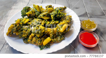 Spinach & potato Pakoras, An extremely delicious and mouth watering snack of Pakistani & Indian Peoples Spinach & potato Pakoras, An extremely delicious and mouth watering snack of Pakistani & Indian Peoples 77788137