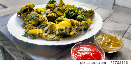Spinach & potato Pakoras, An extremely delicious and mouth watering snack of Pakistani & Indian Peoples Spinach & potato Pakoras, An extremely delicious and mouth watering snack of Pakistani & Indian Peoples 77788138