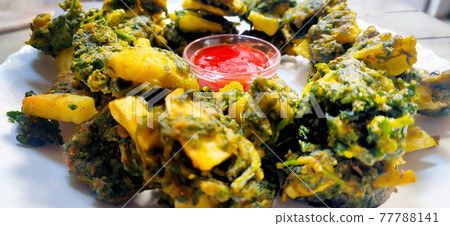 Spinach & potato Pakoras, An extremely delicious and mouth watering snack of Pakistani & Indian Peoples Spinach & potato Pakoras, An extremely delicious and mouth watering snack of Pakistani & Indian Peoples 77788141