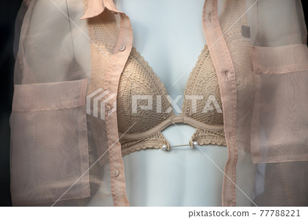 Green Transparent Bra on Mannequin in Fashion Store Showroom Stock