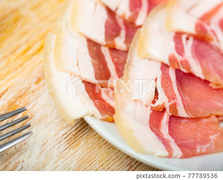 Pieces of raw pork lard Pieces of raw pork lard 77789536