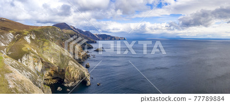 Aerial view of the beautiful coast at Malin Beg with Slieve League in the background in County Donegal, Ireland 77789884