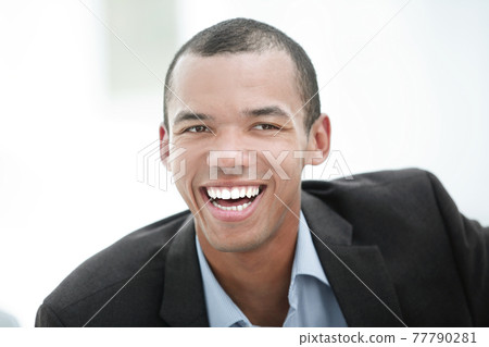 closeup. portrait of a handsome business man closeup. portrait of a handsome business man 77790281