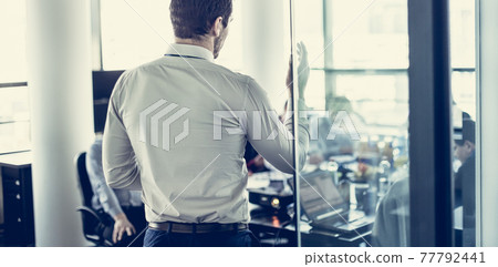 Team leader making presentation on corporate business meeting. Team leader making presentation on corporate business meeting. 77792441