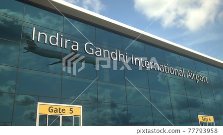 Airliner landing reflecting in the windows with Indira Gandhi International Airport text. 3d rendering Airliner landing reflecting in the windows with Indira Gandhi International Airport text. 3d rendering 77793958